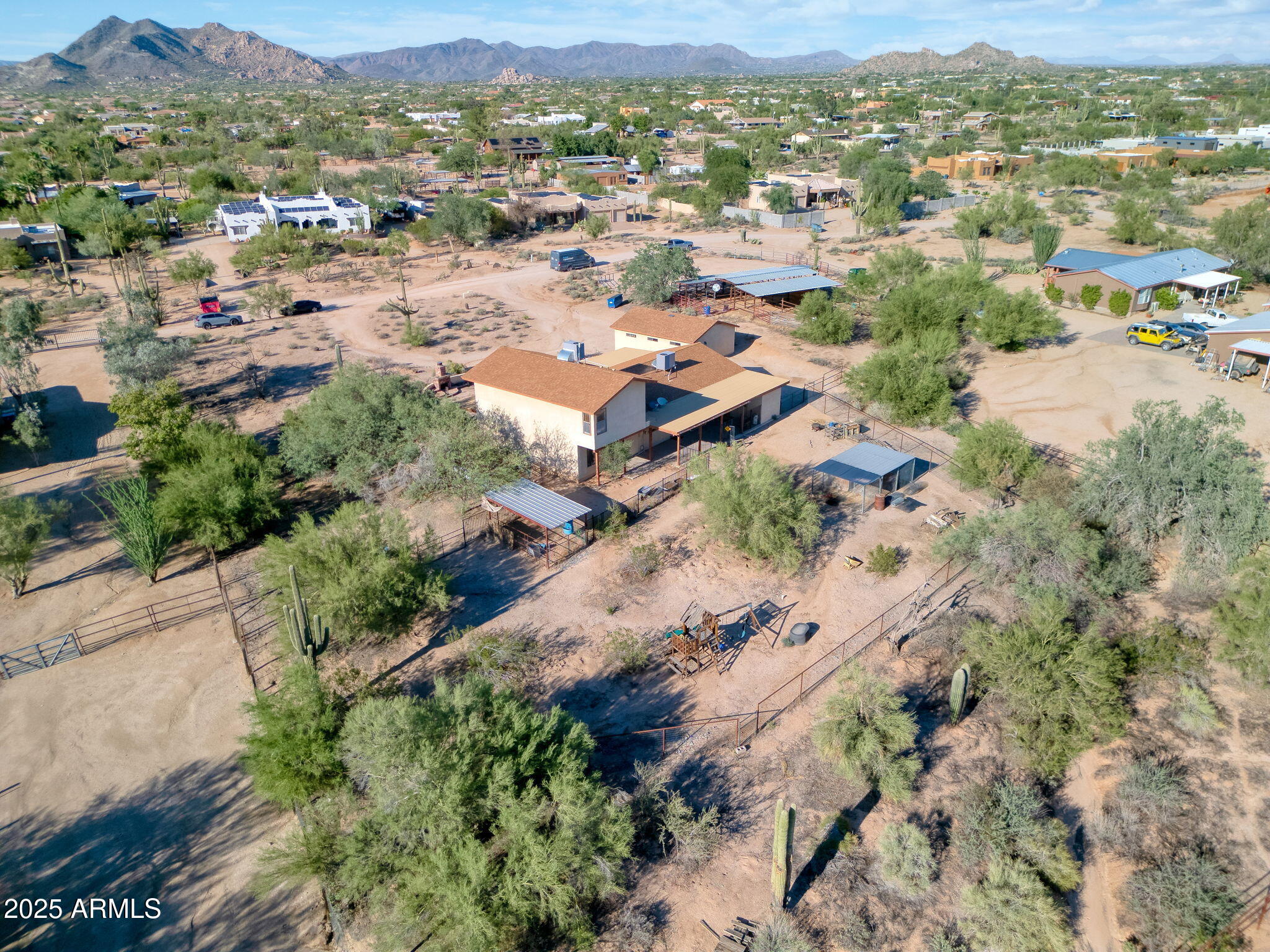 6319 East Lowden Road Cave Creek, AZ 85331 - Photo 4 of 52 an aerial view of residential houses with outdoor space