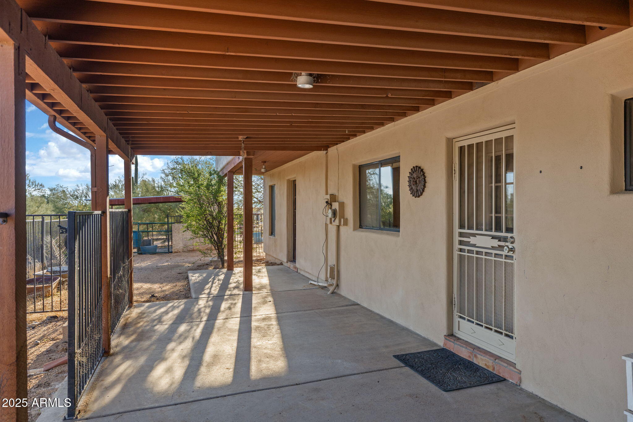 6319 East Lowden Road Cave Creek, AZ 85331 - Photo 49 of 52 a porch with seating space