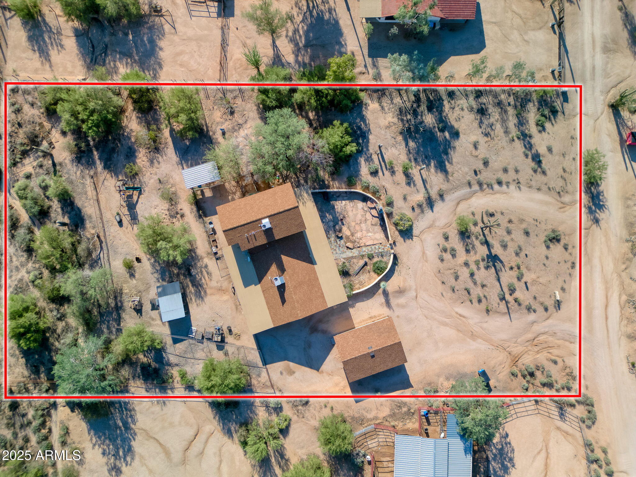 6319 East Lowden Road Cave Creek, AZ 85331 - Photo 6 of 52 an aerial view of a house with a yard and garden