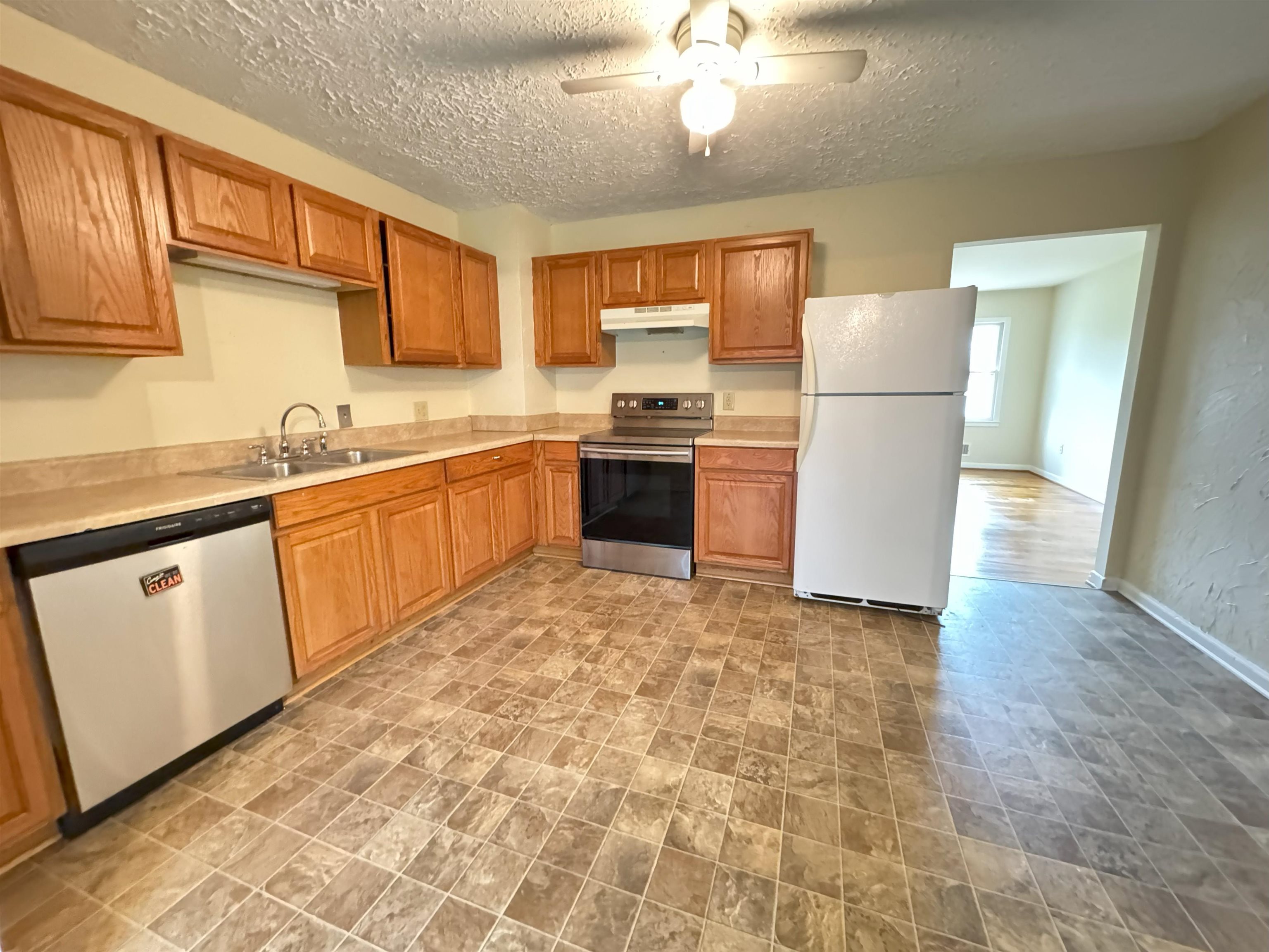 111 Devon Road Staunton, VA 24401 - Photo 14 of 28 a kitchen with a sink appliances and cabinets