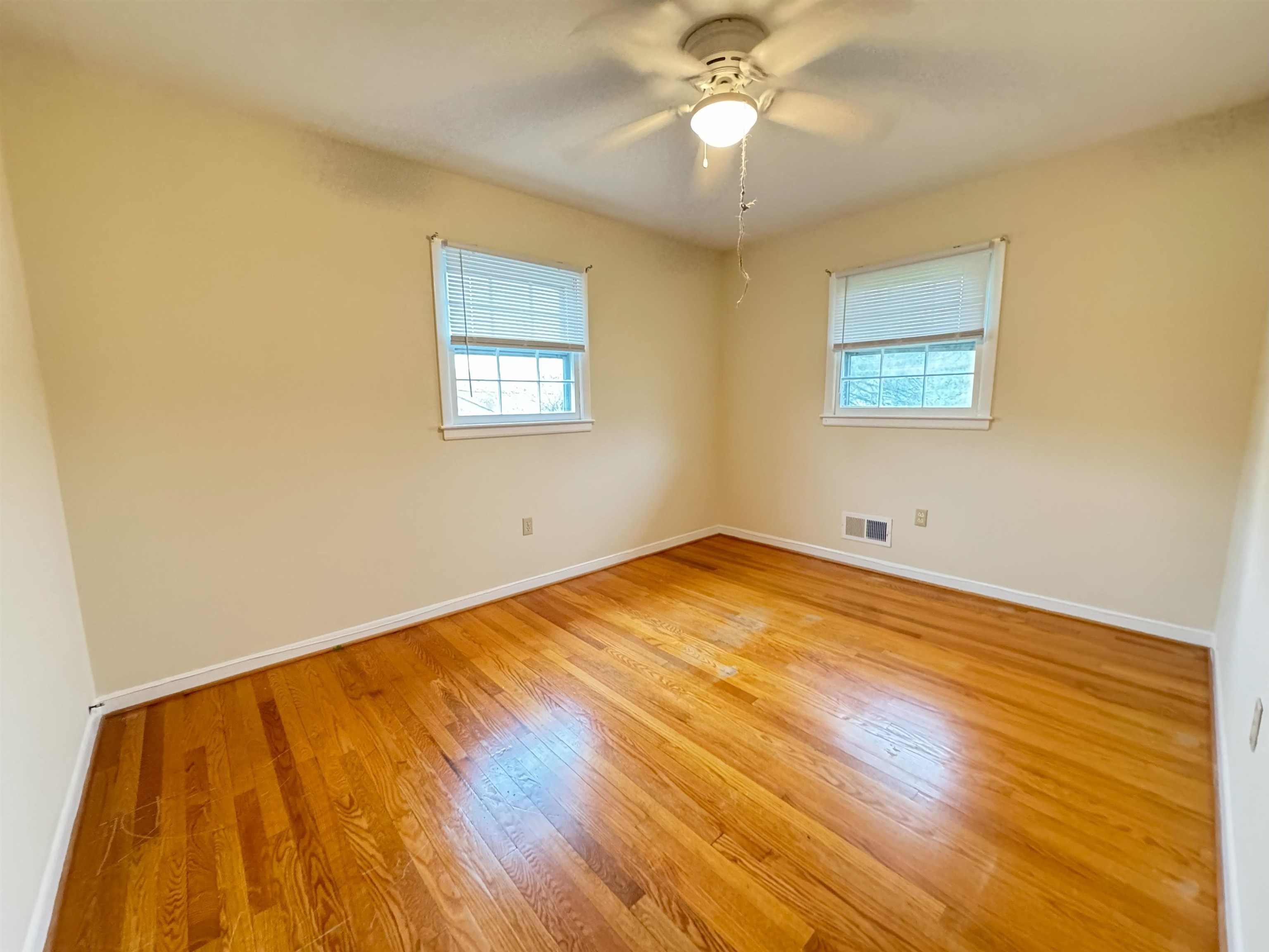 111 Devon Road Staunton, VA 24401 - Photo 22 of 28 a view of empty room with wooden floor
