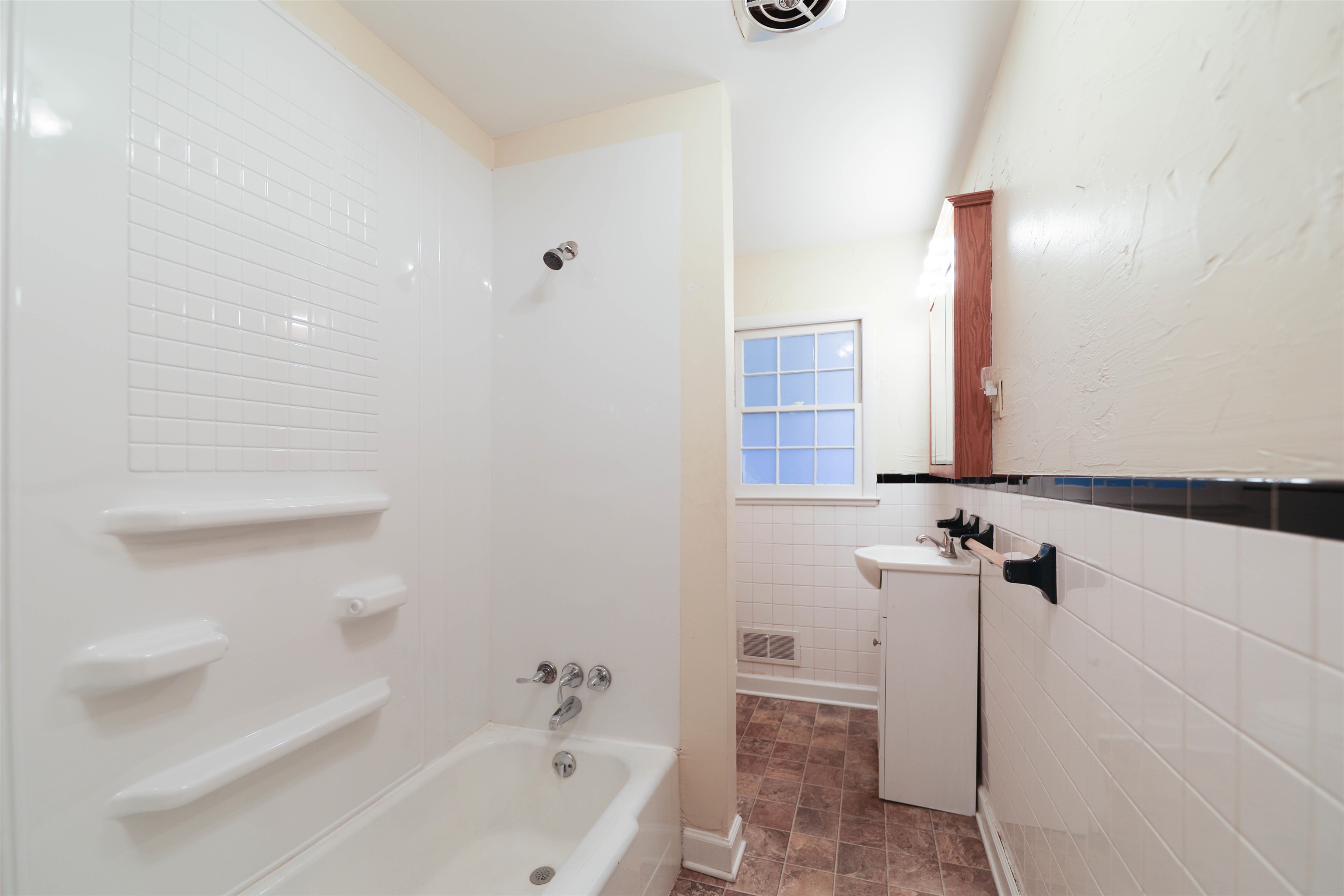 111 Devon Road Staunton, VA 24401 - Photo 26 of 28 a bathroom with a bathtub and a shower