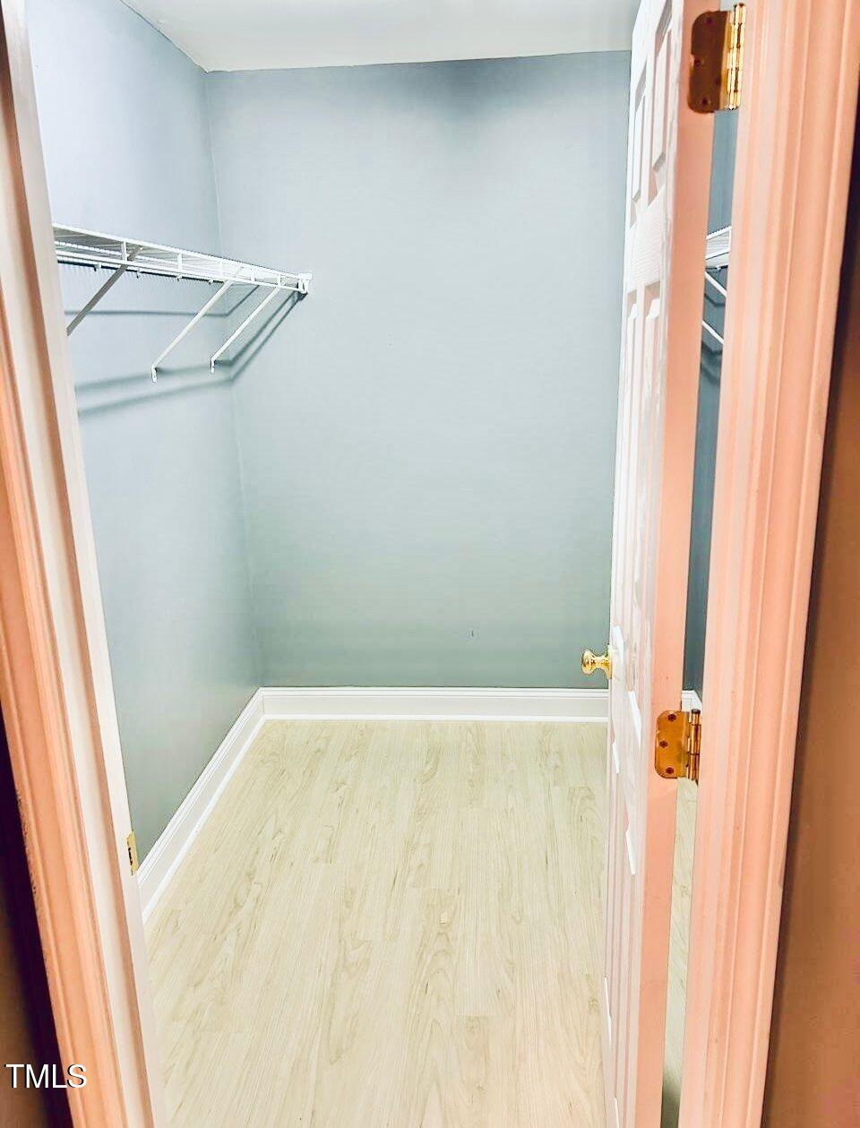 33 Sharpstone Lane Durham, NC 27703 - Photo 13 of 17 a view of a room with racks on the wall