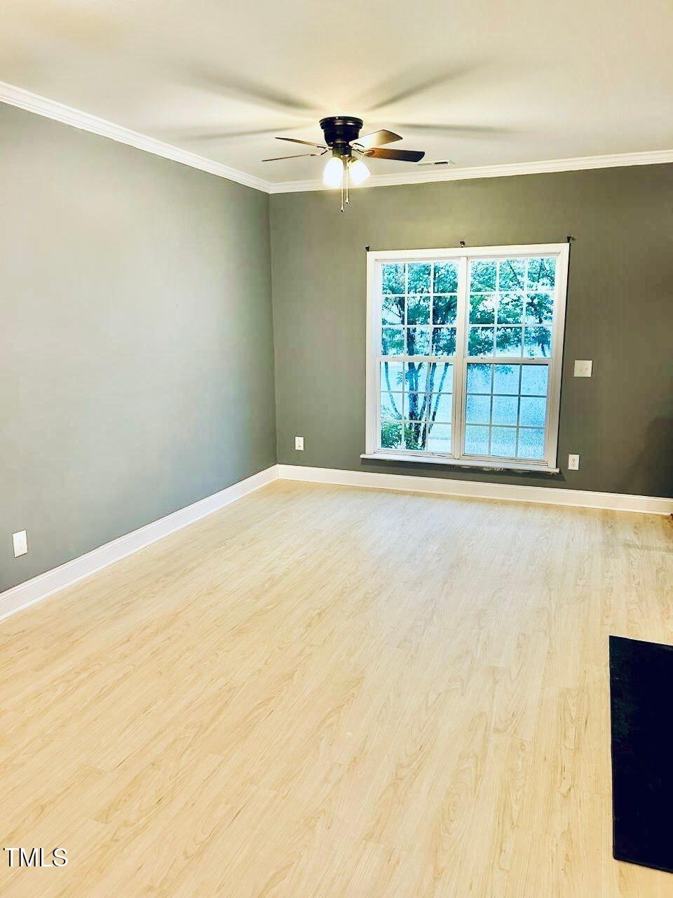 33 Sharpstone Lane Durham, NC 27703 - Photo 4 of 17 a view of an empty room with a window