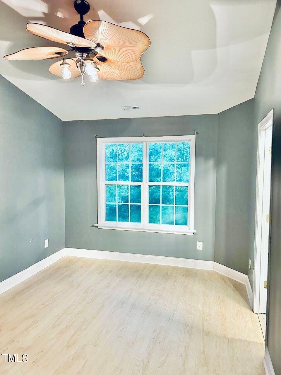 33 Sharpstone Lane Durham, NC 27703 - Photo 10 of 17 a view of an empty room with a window
