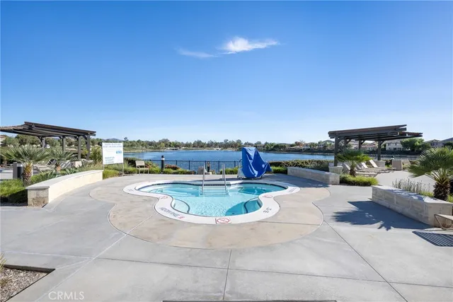 a bedroom with a bed and flat screen tv