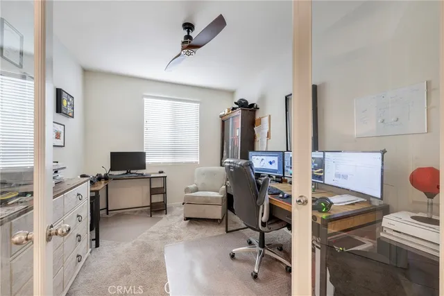 a bathroom with a double vanity sink mirror and bathtub