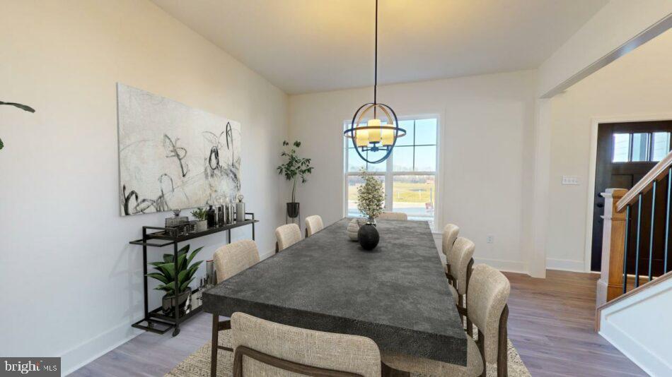 0 Marys Way, Unit DANBURY Harrisburg, PA 17112 - Photo 13 of 26 a view of a dining room with furniture window and wooden floor