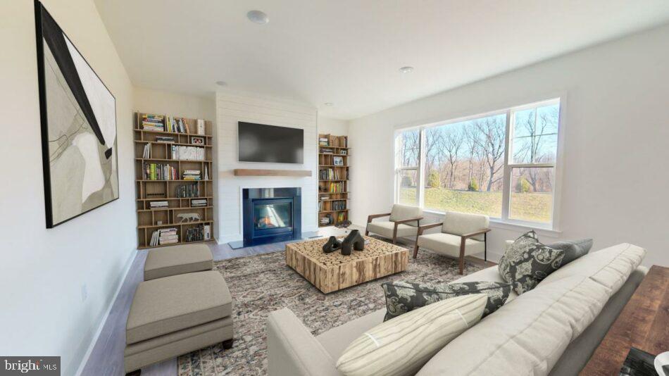 0 Marys Way, Unit DANBURY Harrisburg, PA 17112 - Photo 8 of 26 a living room with furniture fireplace and a flat screen tv