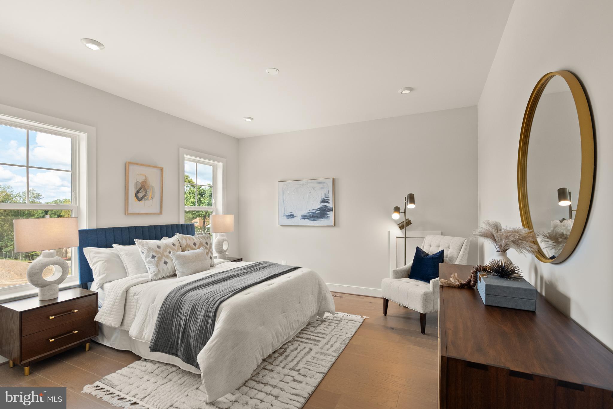 7203 Barnett Road Bethesda, MD 20817 - Photo 23 of 29 a bedroom with bed a mirror and a window