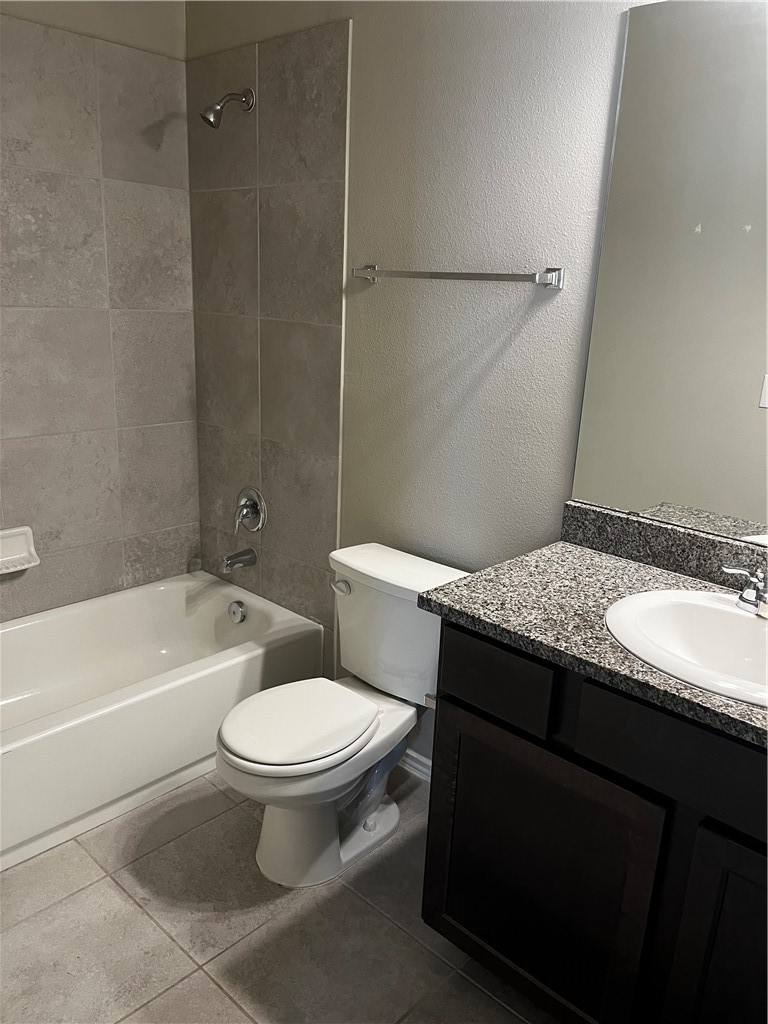 1725 Davidson Ranch Road Georgetown, TX 78626 - Photo 5 of 8 a bathroom with a granite countertop toilet a sink and bathtub