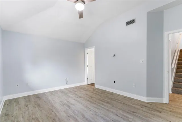 a bathroom with a shower and a sink