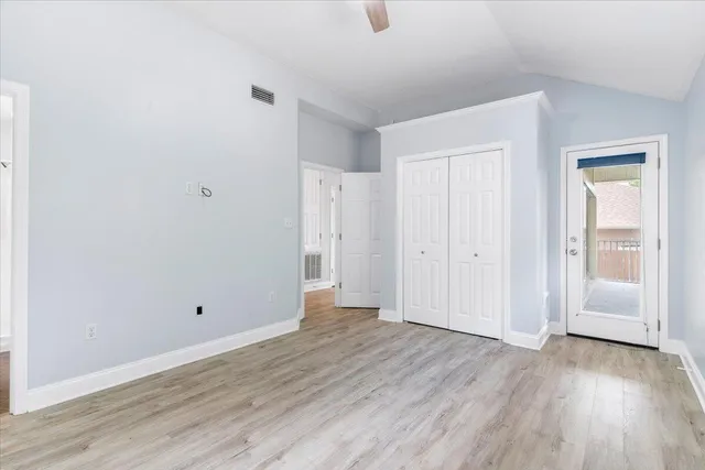 a bathroom with a sink a mirror and a shower