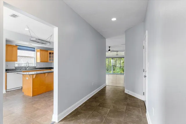 a view of an empty room with a window