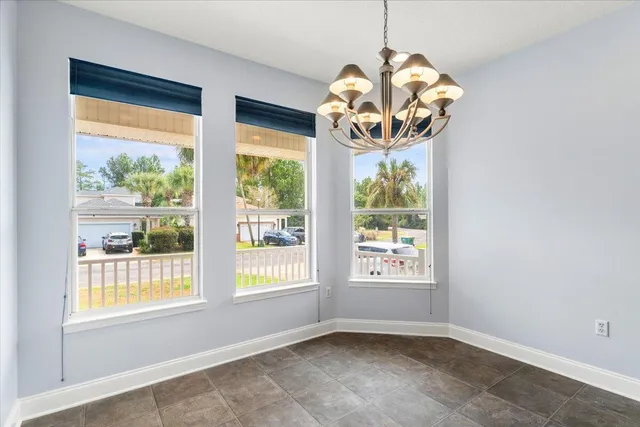 a kitchen with stainless steel appliances granite countertop a white cabinets