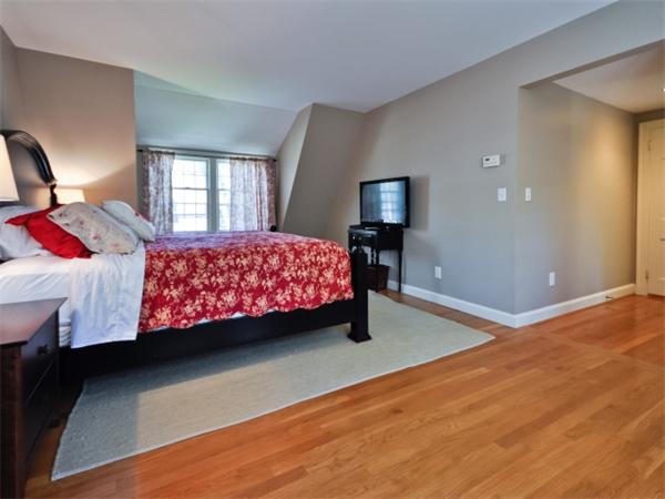 115 Clarke Road Needham, MA 02492 - Photo 8 of 21 a bedroom with a bed and window