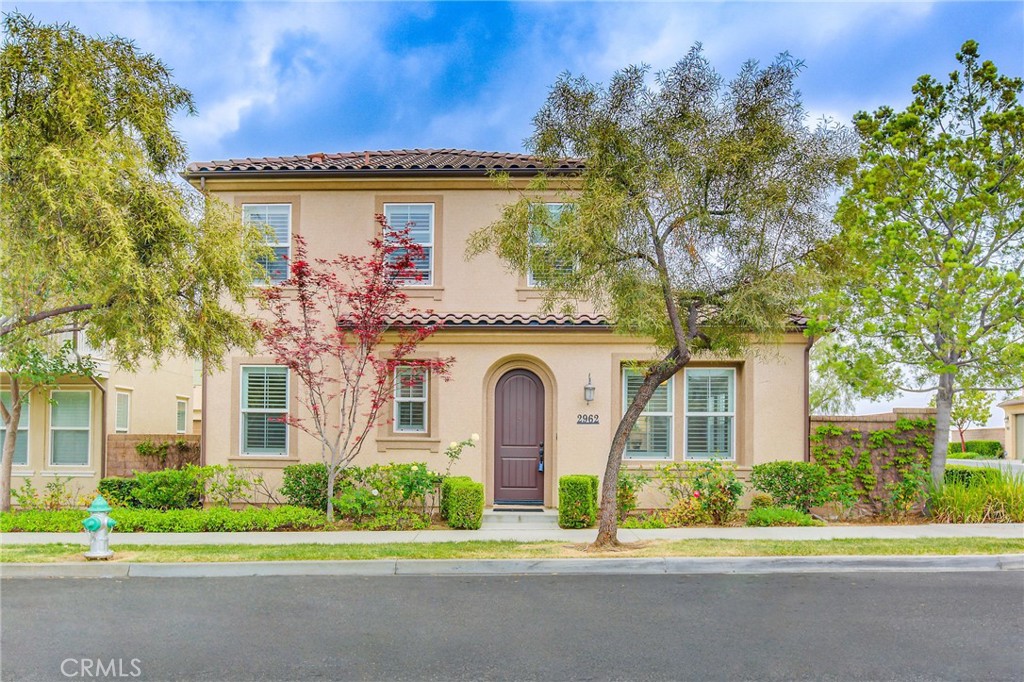 Undisclosed Address Brea, CA 92821 - Photo 1 of 1 a front view of a house with garden and plants