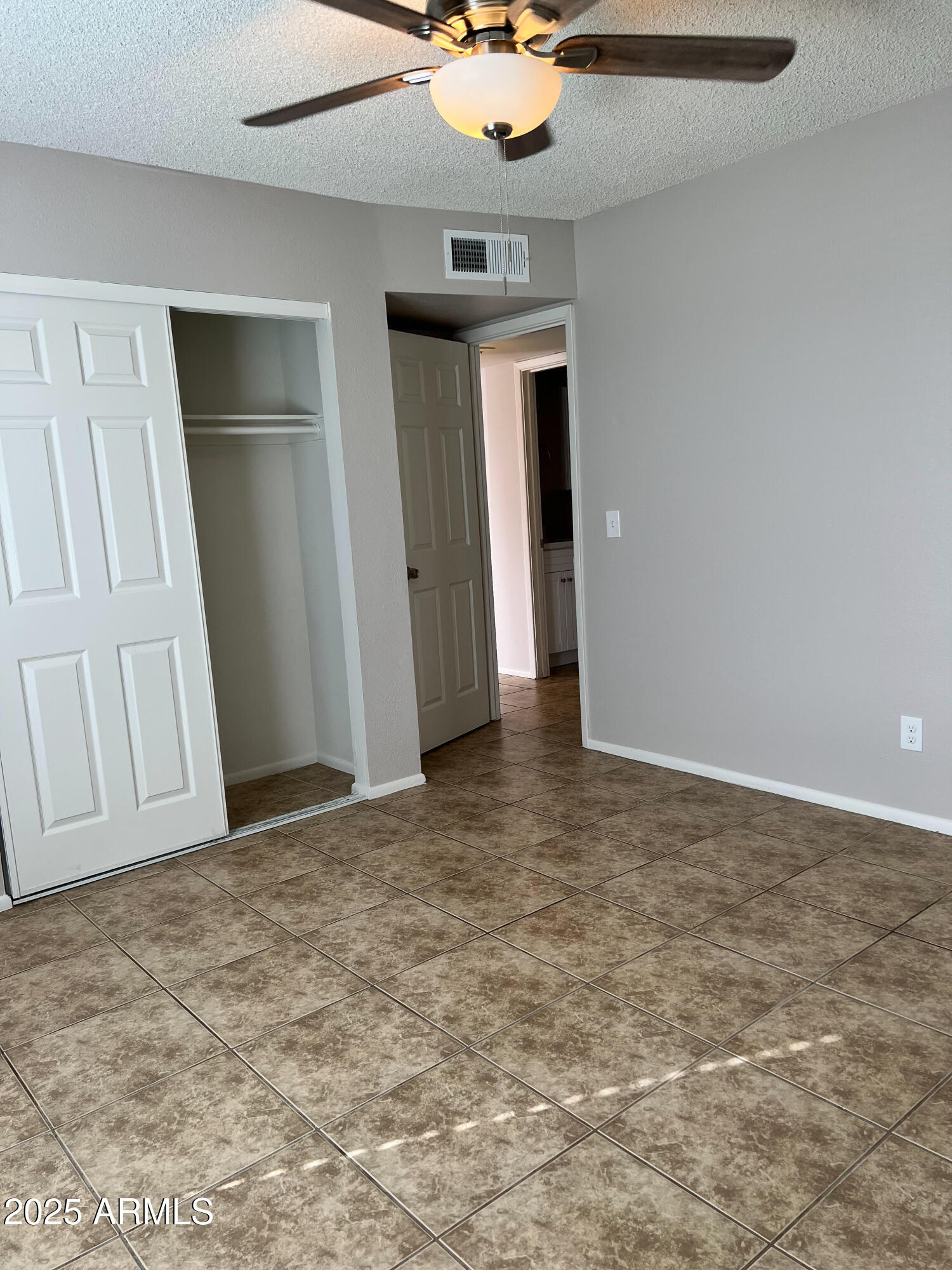 492 West 18th Avenue, Unit 2 Apache Junction, AZ 85120 - Photo 4 of 6 a view of an empty room