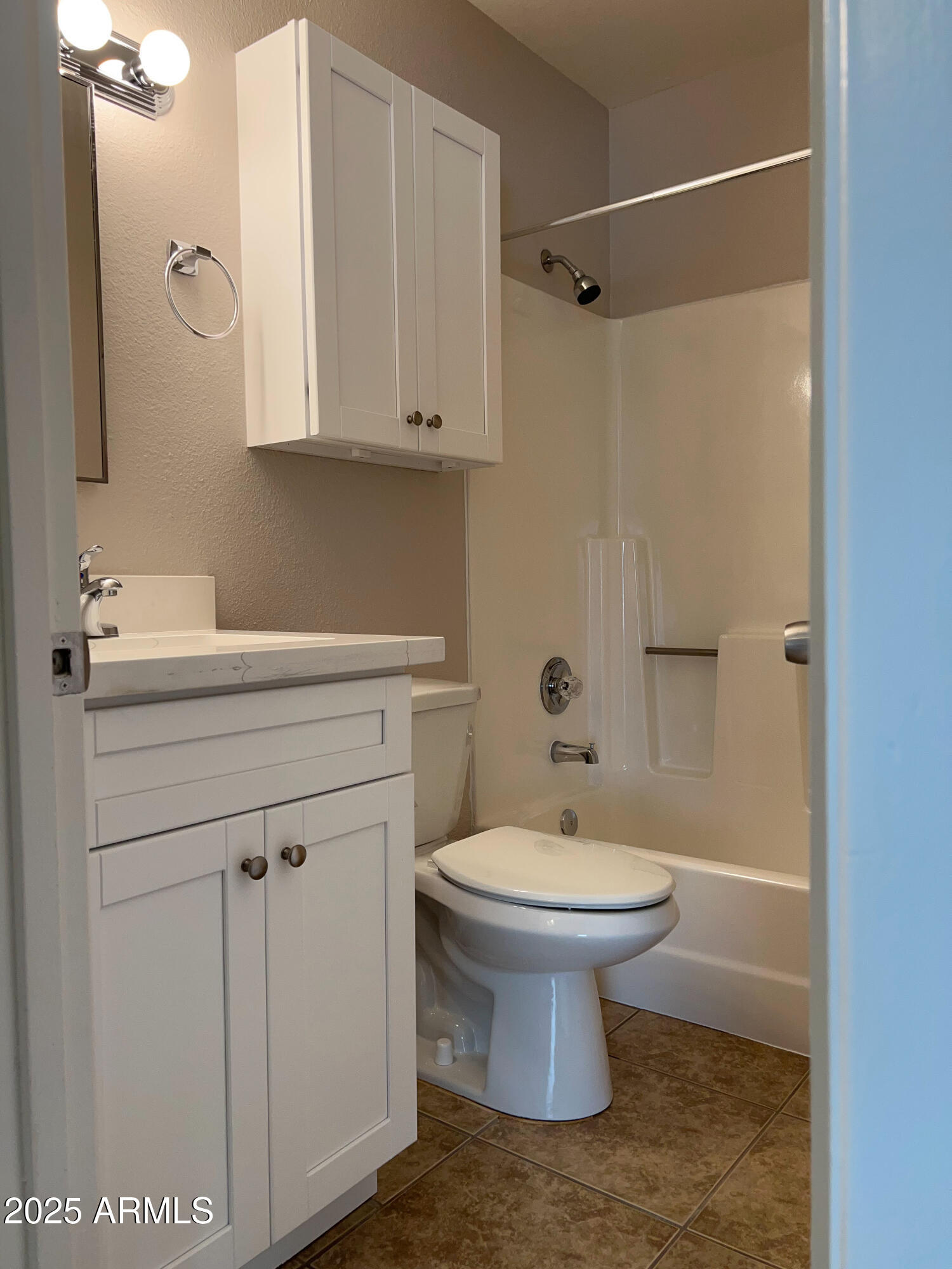 492 West 18th Avenue, Unit 2 Apache Junction, AZ 85120 - Photo 5 of 6 a bathroom with a sink toilet and shower