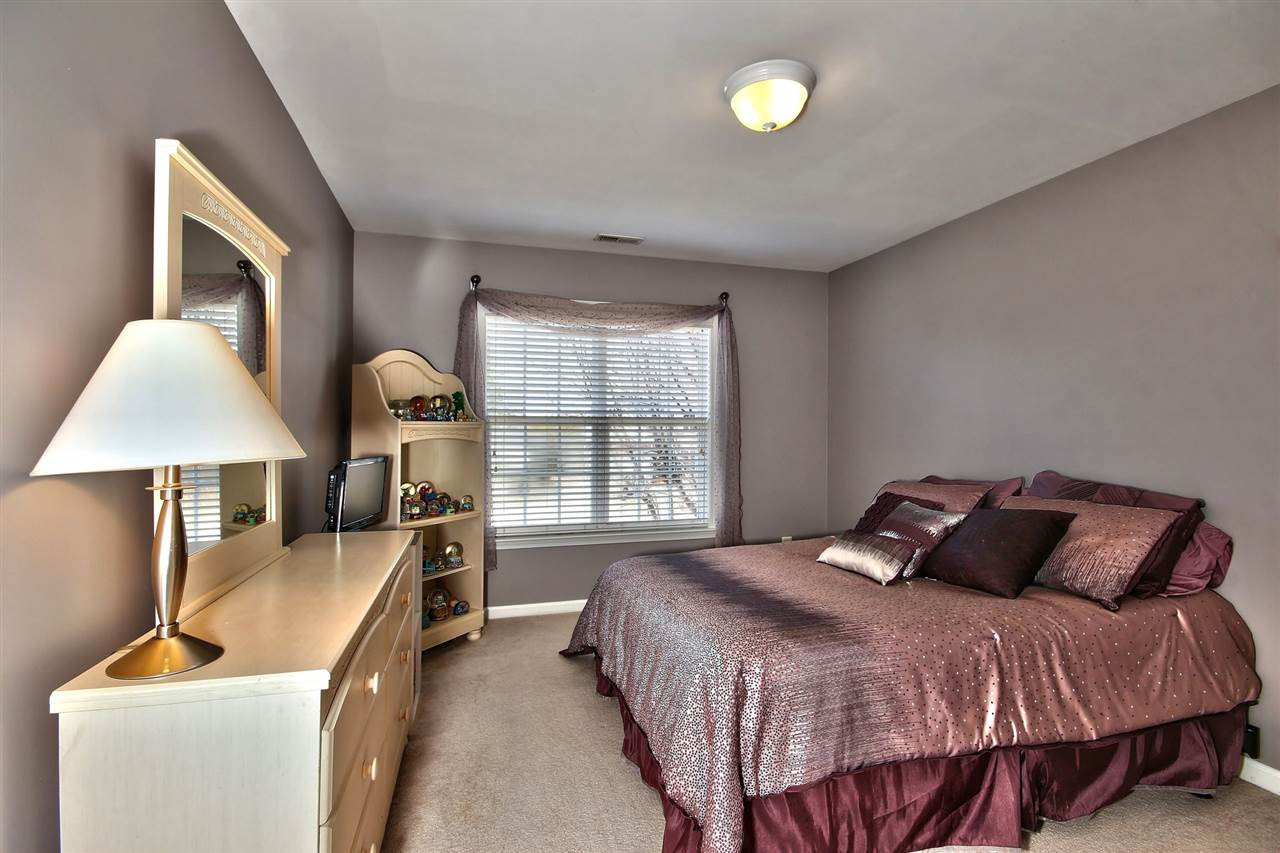 7616 Derek Drive Raleigh, NC 27613 - Photo 17 of 25 All of the bedrooms have ample closet space and the carpets are in fabulous condition. Bedroom