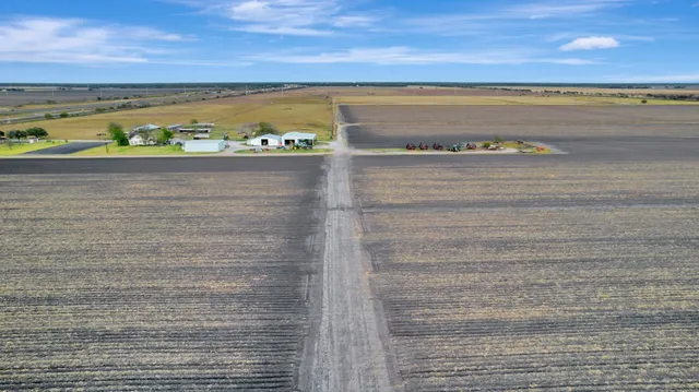 a view of parking garage with cars