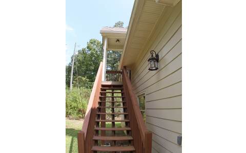 82 Highland Ridge Road Ellijay, GA 30540 - Photo 9 of 14 a view of stairs and furniture
