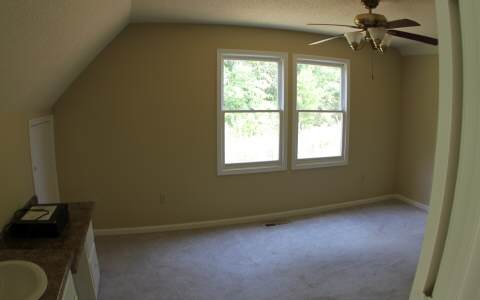 82 Highland Ridge Road Ellijay, GA 30540 - Photo 10 of 14 an empty room with a window