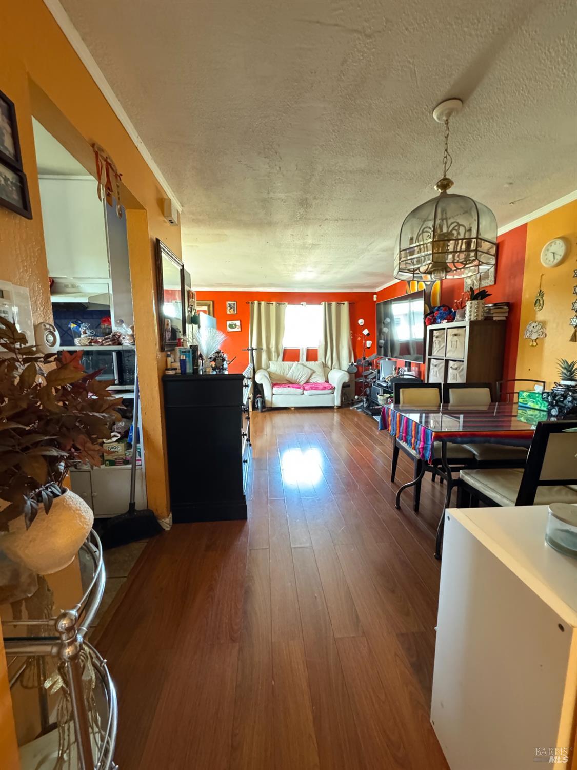 431 Bahia Way San Rafael, CA 94901 - Photo 31 of 46 a living room with furniture and a chandelier