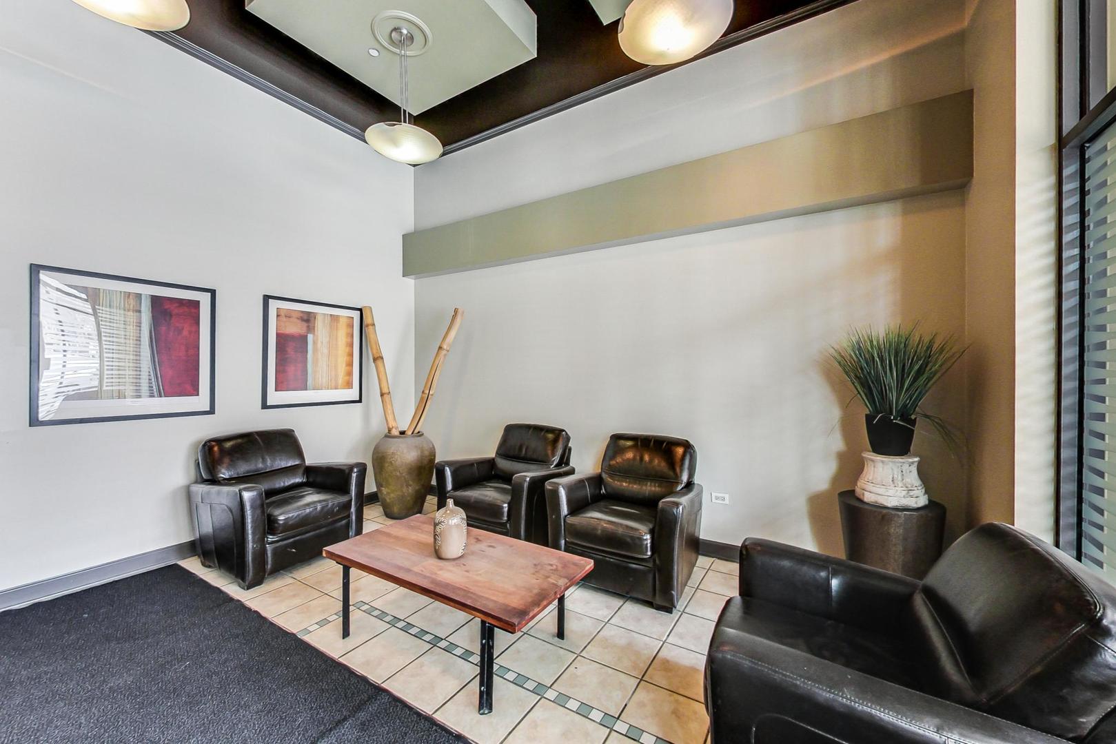 1301 West Madison Street, Unit 216 Chicago, IL 60607 - Photo 5 of 31 a living room with furniture