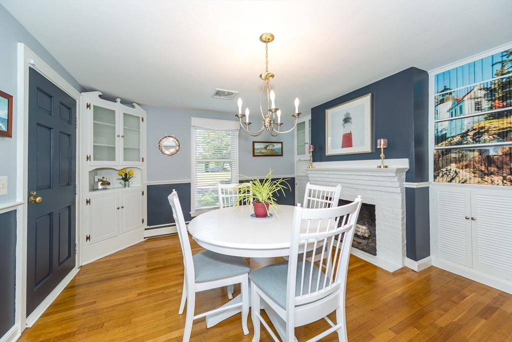 2 Beverly Road Natick, MA 01760 - Photo 15 of 40 a view of a dining room with furniture and chandelier