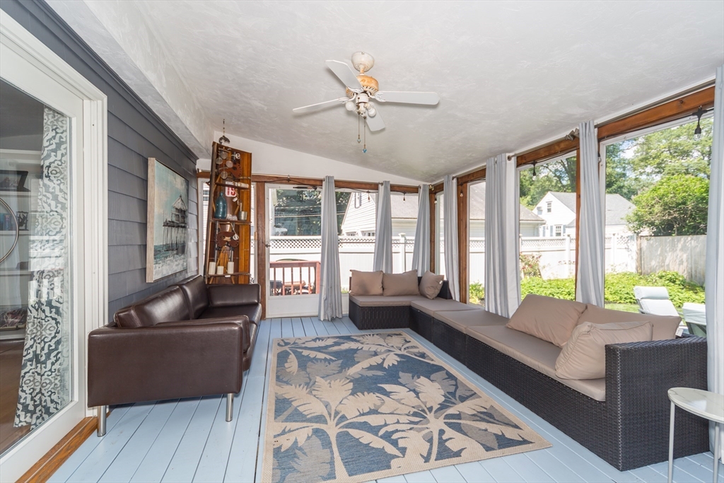 2 Beverly Road Natick, MA 01760 - Photo 34 of 40 a living room with furniture and a large window