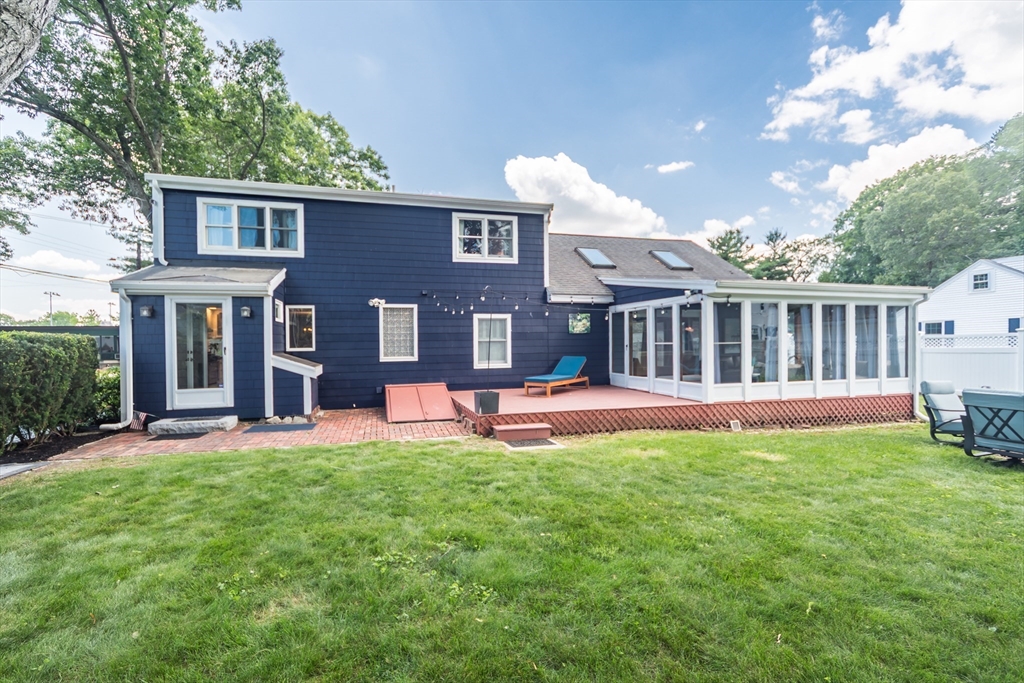 2 Beverly Road Natick, MA 01760 - Photo 38 of 40 a view of a house with a yard and a porch