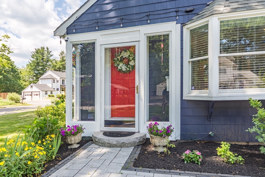 2 Beverly Road Natick, MA 01760 - Photo 4 of 40 a view of a house with potted plants
