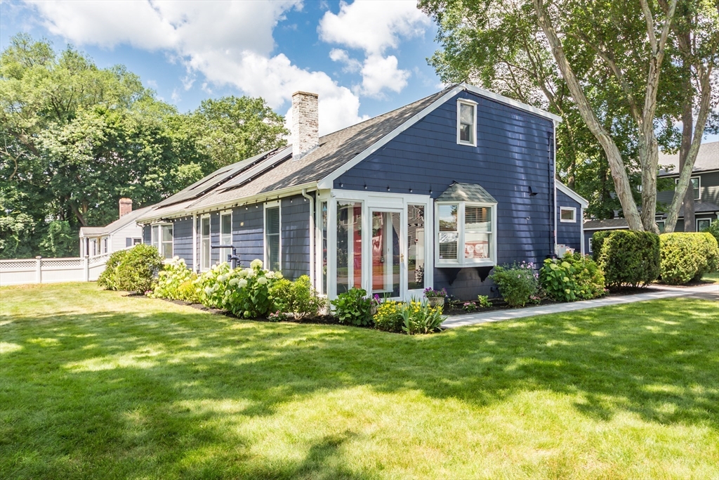 2 Beverly Road Natick, MA 01760 - Photo 5 of 40 a front view of a house with a yard