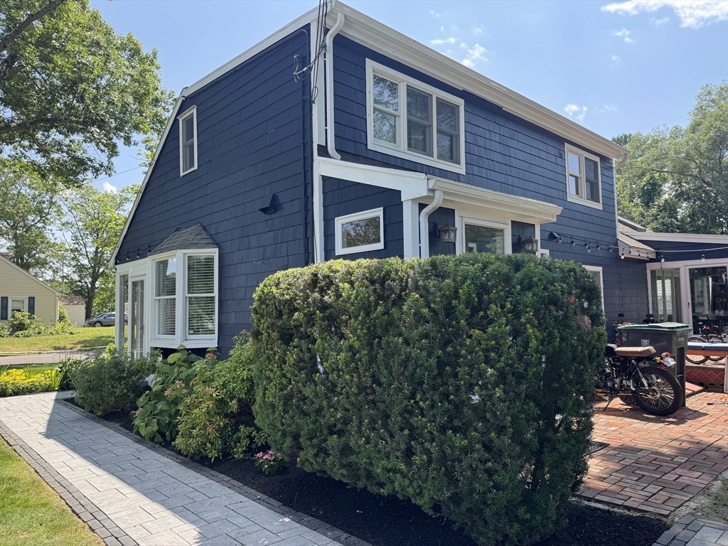 2 Beverly Road Natick, MA 01760 - Photo 6 of 40 a house view with a garden space