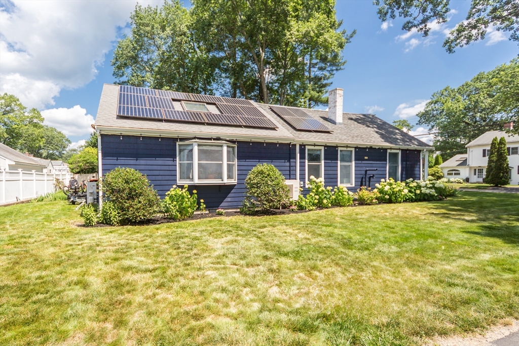 2 Beverly Road Natick, MA 01760 - Photo 8 of 40 a front view of a house with a yard