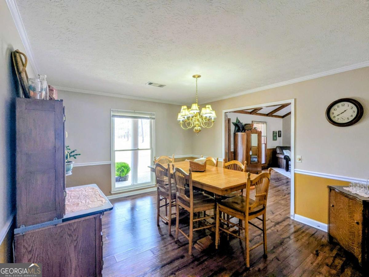 2005 Adams Street Vidalia, GA 30474 - Photo 13 of 50 a view of a dining room with furniture and window