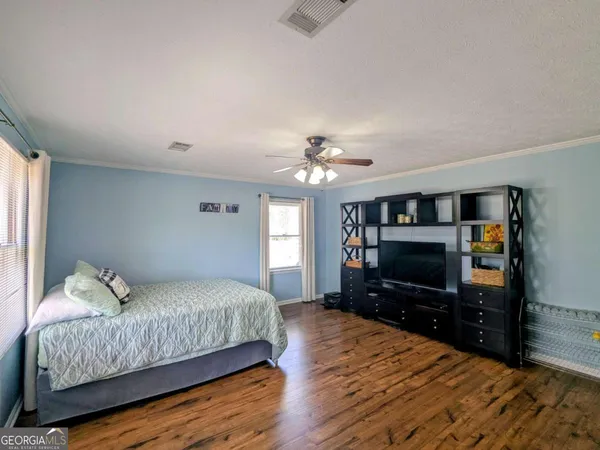 a view of entryway with wooden floor