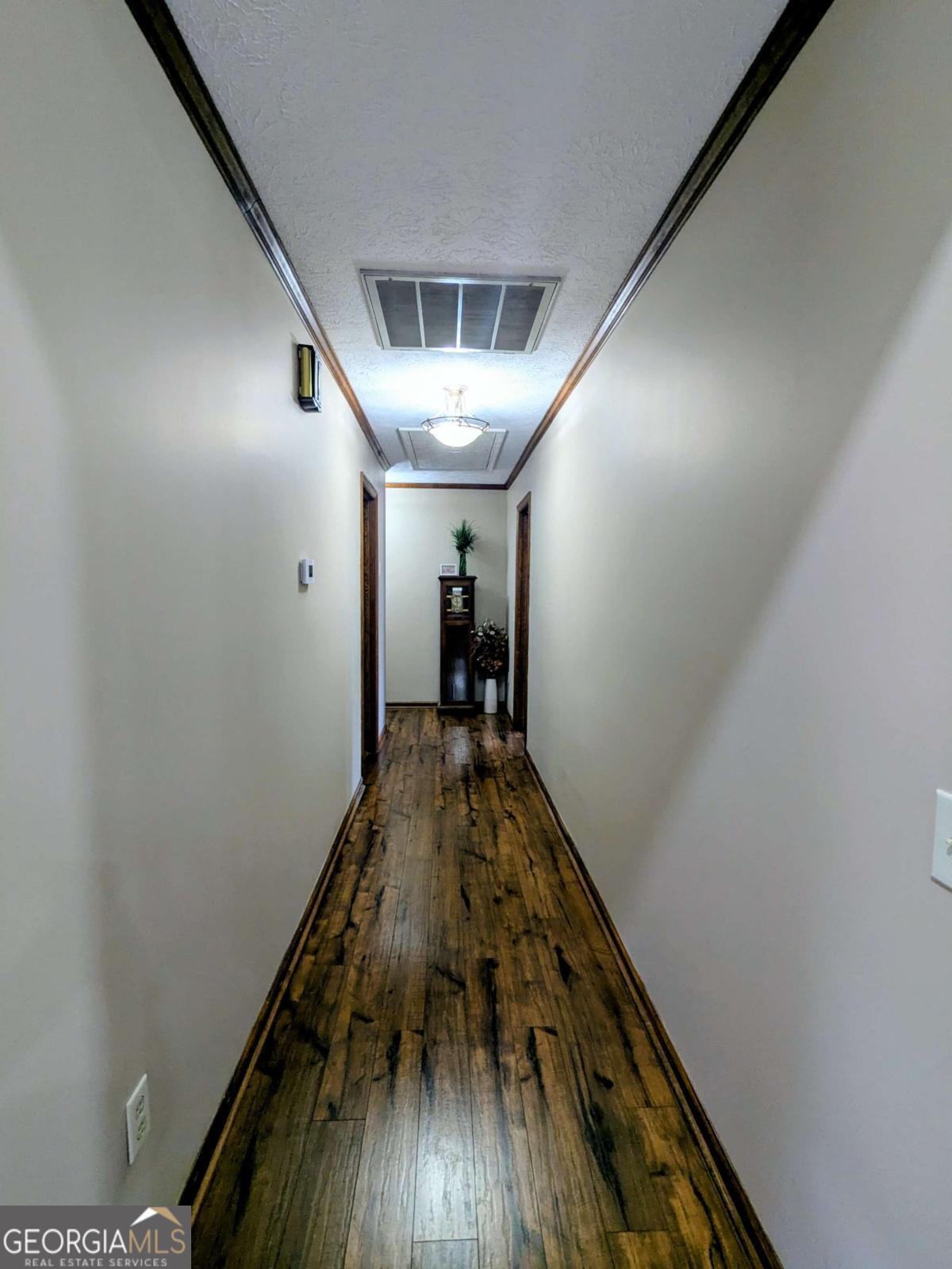 2005 Adams Street Vidalia, GA 30474 - Photo 23 of 50 a view of entryway with wooden floor