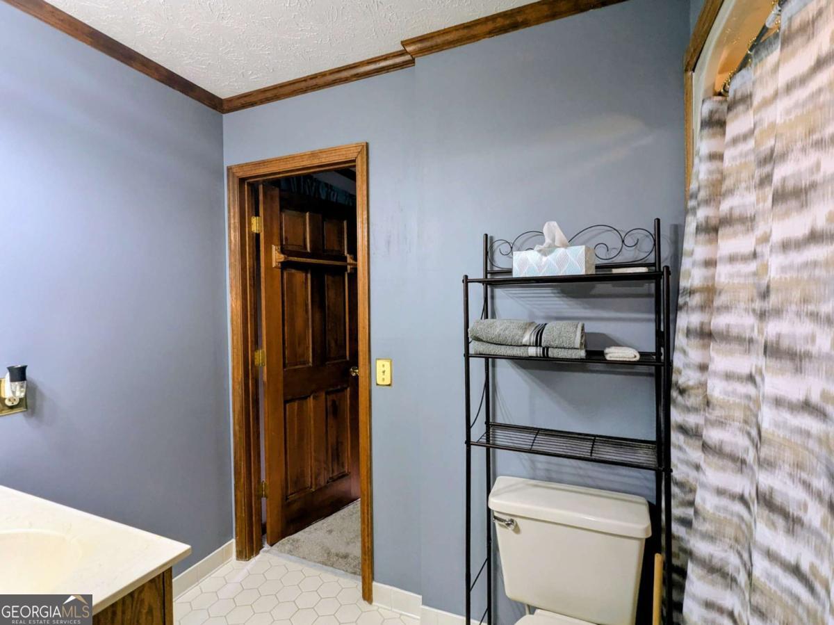 2005 Adams Street Vidalia, GA 30474 - Photo 27 of 50 a room with storage and utility