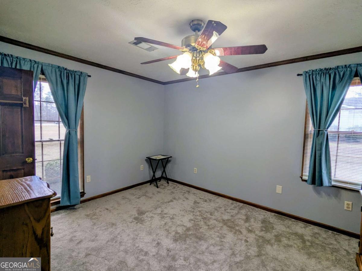2005 Adams Street Vidalia, GA 30474 - Photo 29 of 50 a view of an empty room with a window
