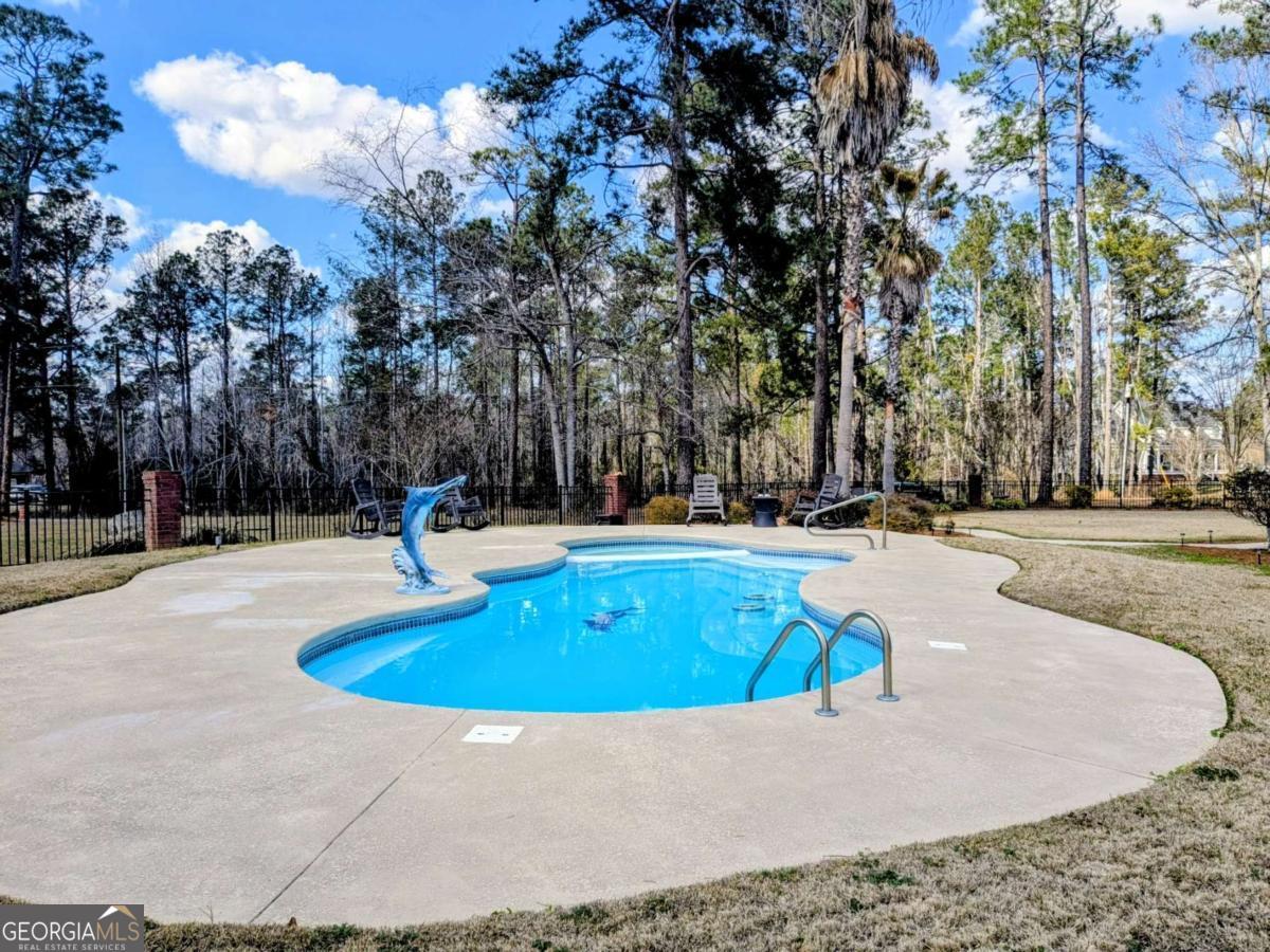 2005 Adams Street Vidalia, GA 30474 - Photo 43 of 50 a view of outdoor space yard and swimming pool