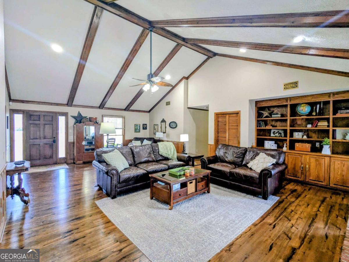 2005 Adams Street Vidalia, GA 30474 - Photo 8 of 50 a living room with furniture and wooden floor