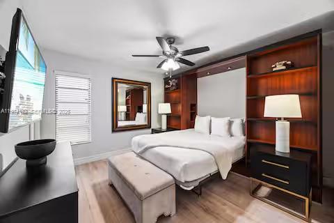 6140 Southwest 56th Court Davie, FL 33314 - Photo 23 of 69 Boutique hotel bedroom vibes with custom wood built-ins!