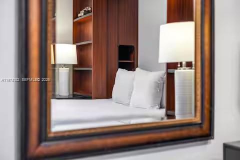 6140 Southwest 56th Court Davie, FL 33314 - Photo 24 of 69 Mirror reflection of modern bedroom perfection!