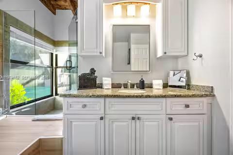 6140 Southwest 56th Court Davie, FL 33314 - Photo 26 of 69 Pristine powder room with granite counters and garden views!