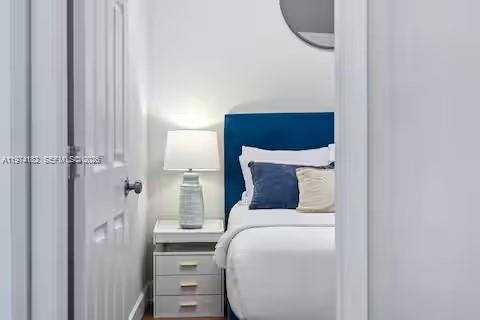 6140 Southwest 56th Court Davie, FL 33314 - Photo 30 of 69 Intimate bedroom retreat with navy nautical vibes!