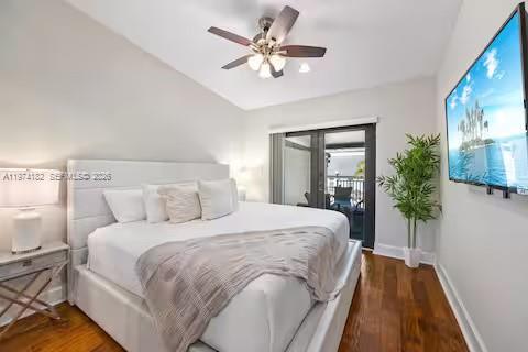 6140 Southwest 56th Court Davie, FL 33314 - Photo 37 of 69 White bedroom bliss with private balcony access!