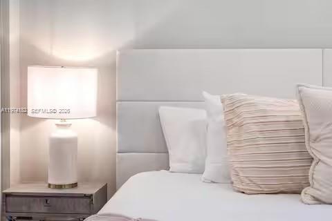 6140 Southwest 56th Court Davie, FL 33314 - Photo 38 of 69 Tufted headboard luxury with soft neutral tones!