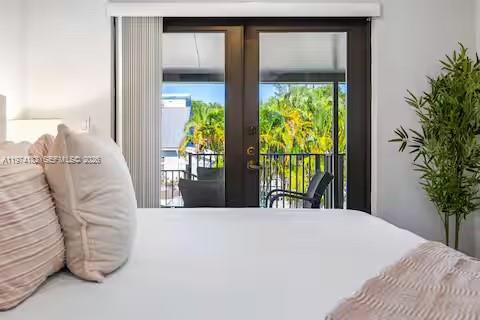 6140 Southwest 56th Court Davie, FL 33314 - Photo 39 of 69 Serene bedroom with French doors to paradise!